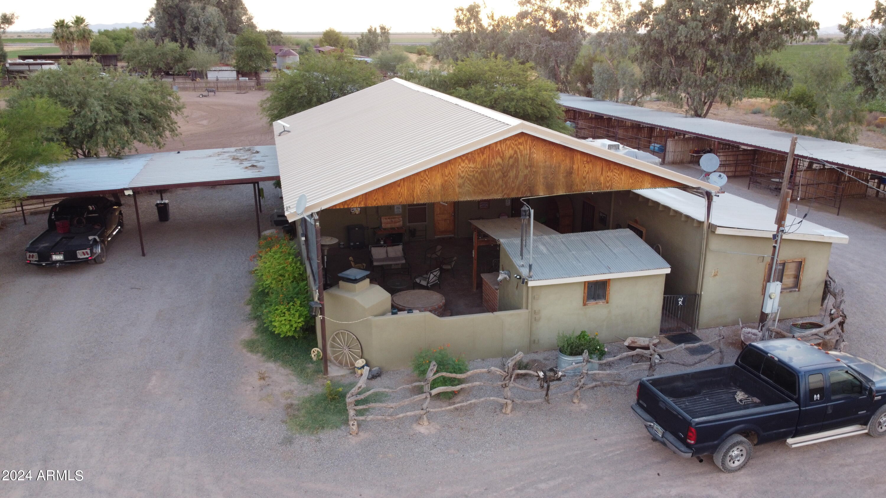 642 East Cornman Road Coolidge, AZ 85128 - Photo 13 of 64 a view of backyard with outdoor seating and mountain view