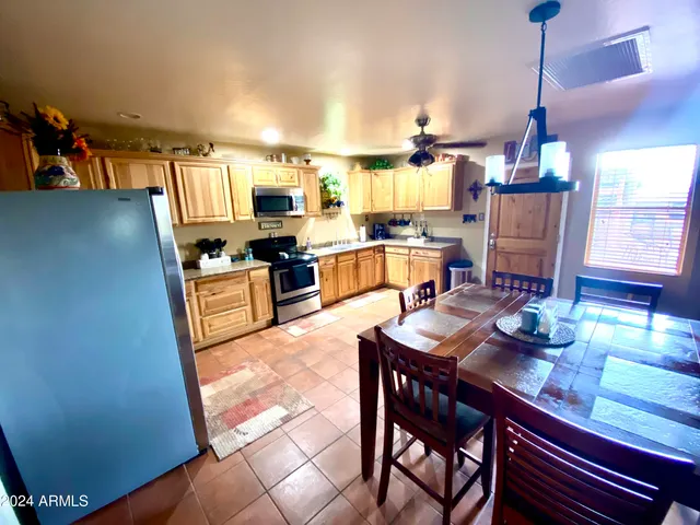 a bedroom with bed and window