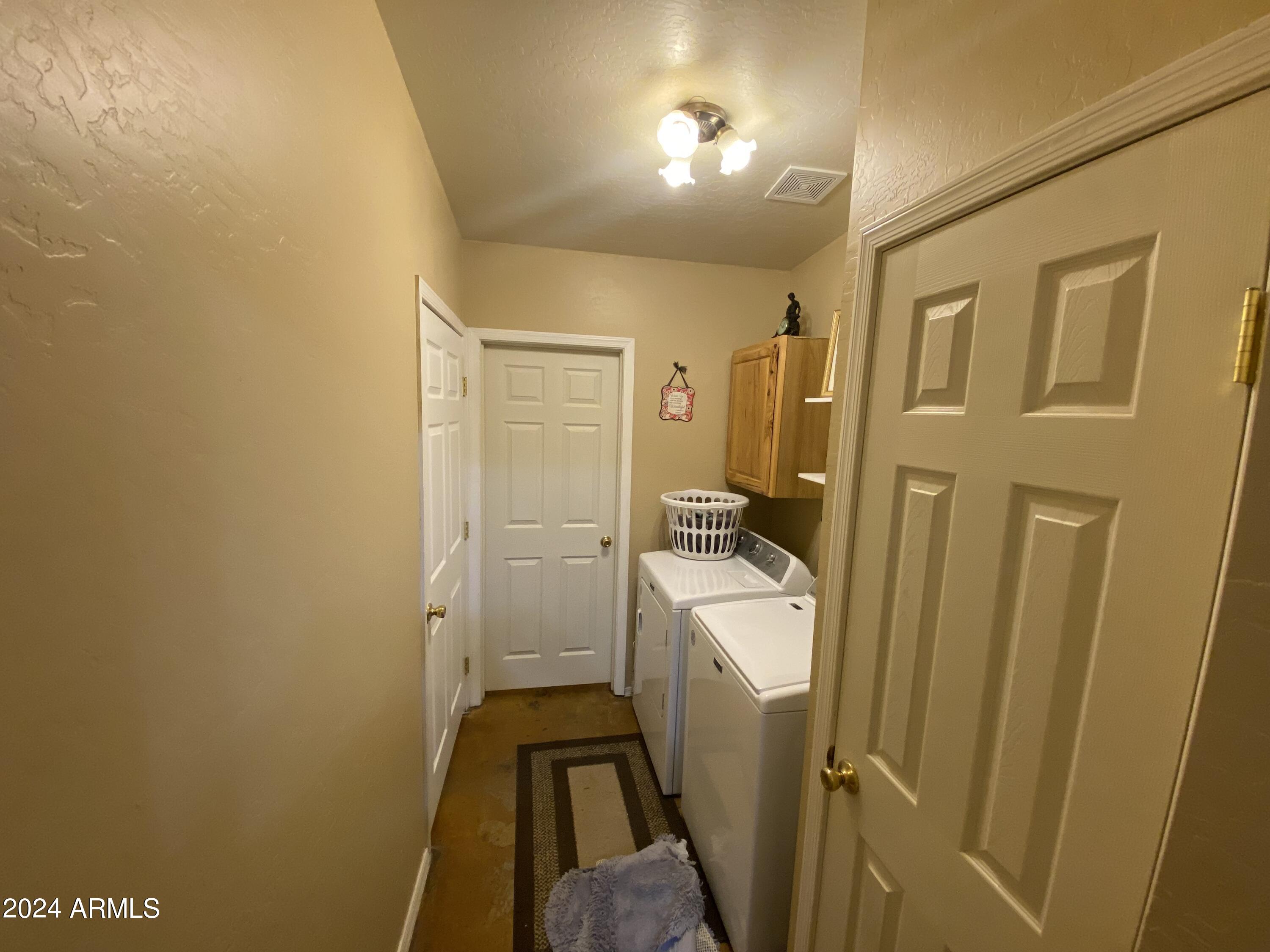 642 East Cornman Road Coolidge, AZ 85128 - Photo 23 of 64 a bathroom with a sink a toilet and shower
