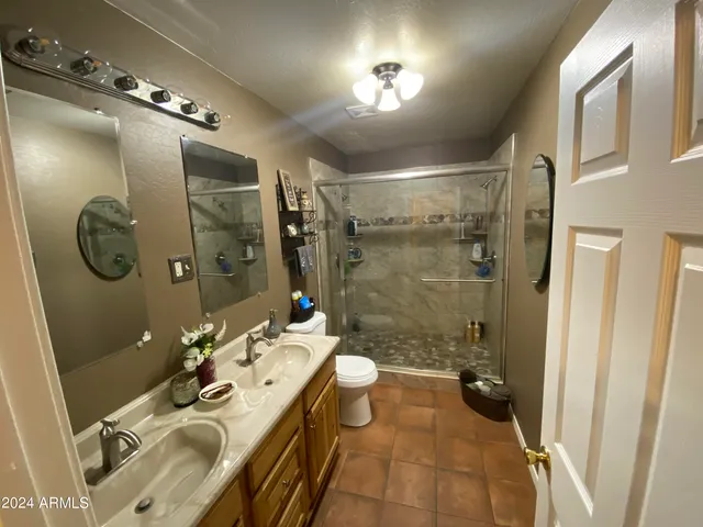 a view of swimming pool with patio