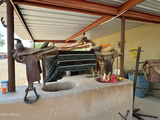 a view of a livingroom with storage and utility