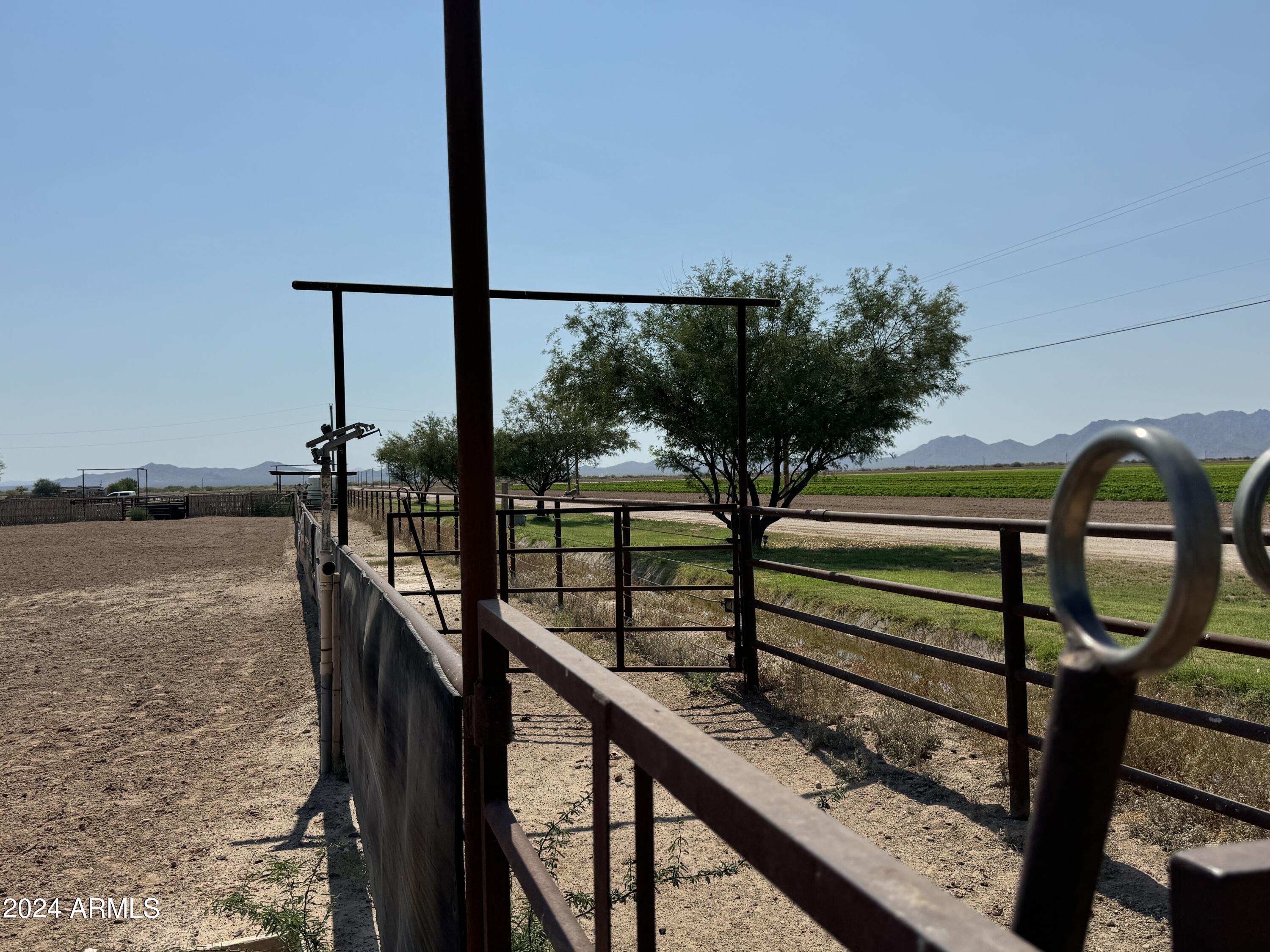 642 East Cornman Road Coolidge, AZ 85128 - Photo 36 of 64 a view of a balcony with wooden floor and fence