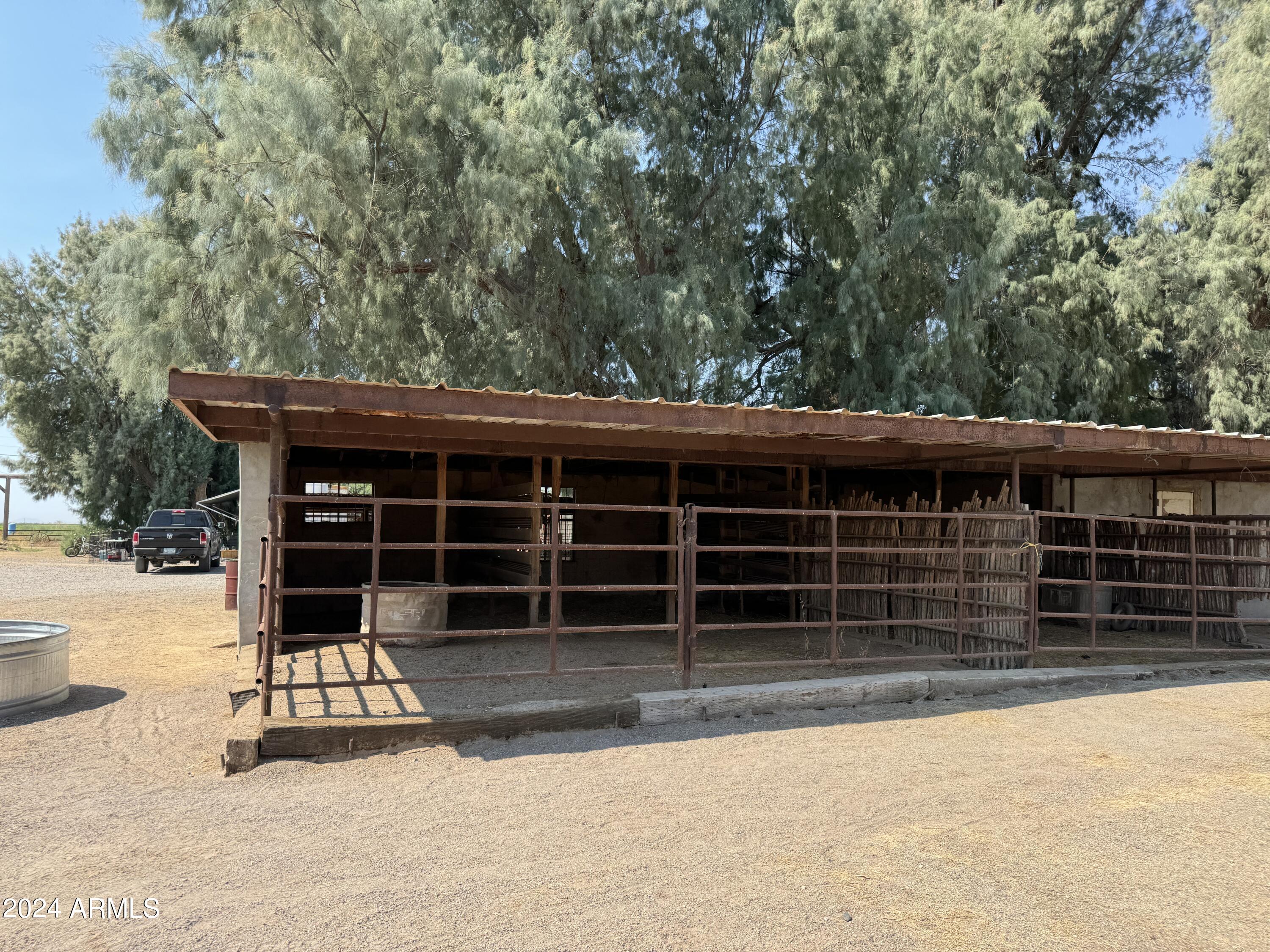 642 East Cornman Road Coolidge, AZ 85128 - Photo 46 of 64 a front view of a house with a garage