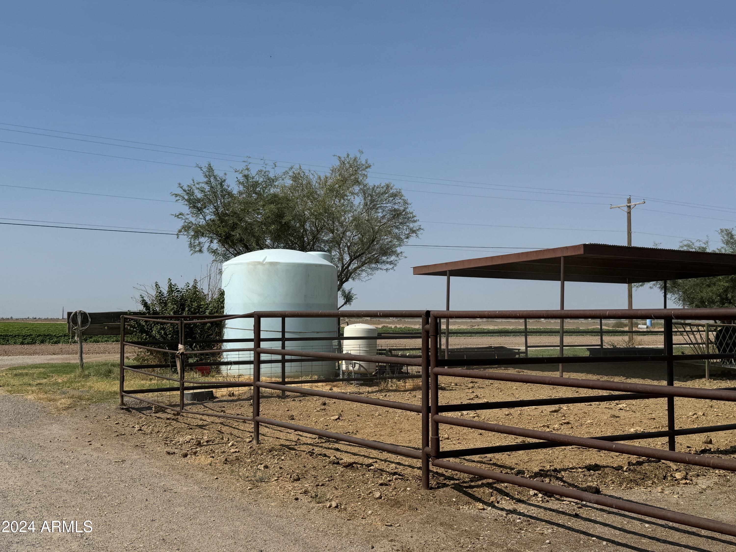 642 East Cornman Road Coolidge, AZ 85128 - Photo 56 of 64 a view of a chairs and table on the terrace
