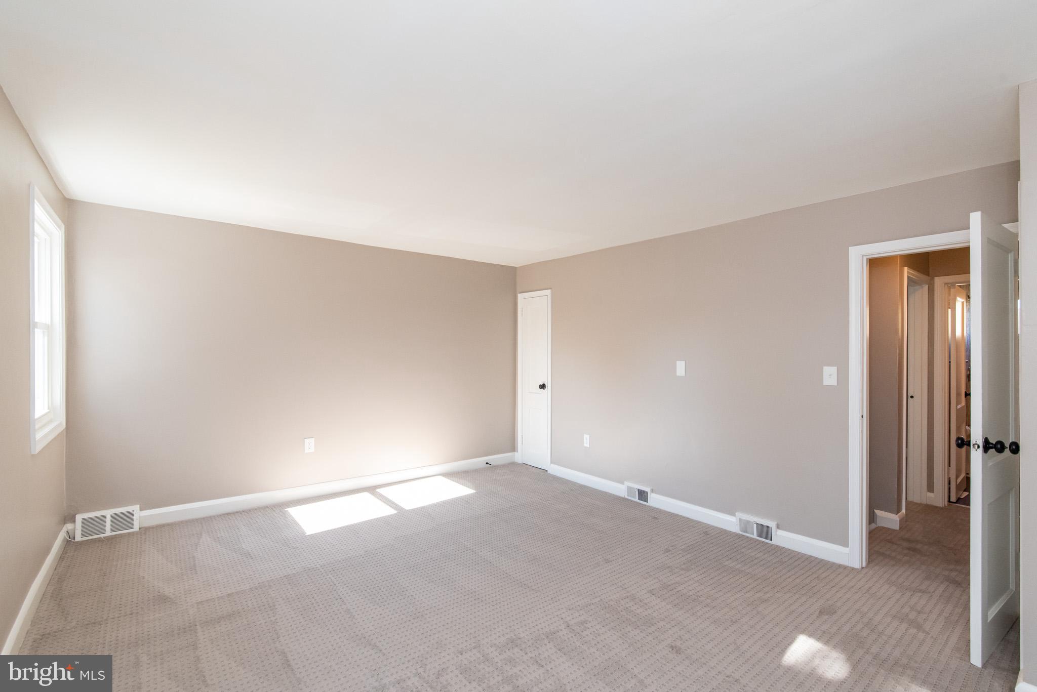 1812 Swansea Road Baltimore, MD 21239 - Photo 19 of 37 Large master bedroom with nautural sunlight galore