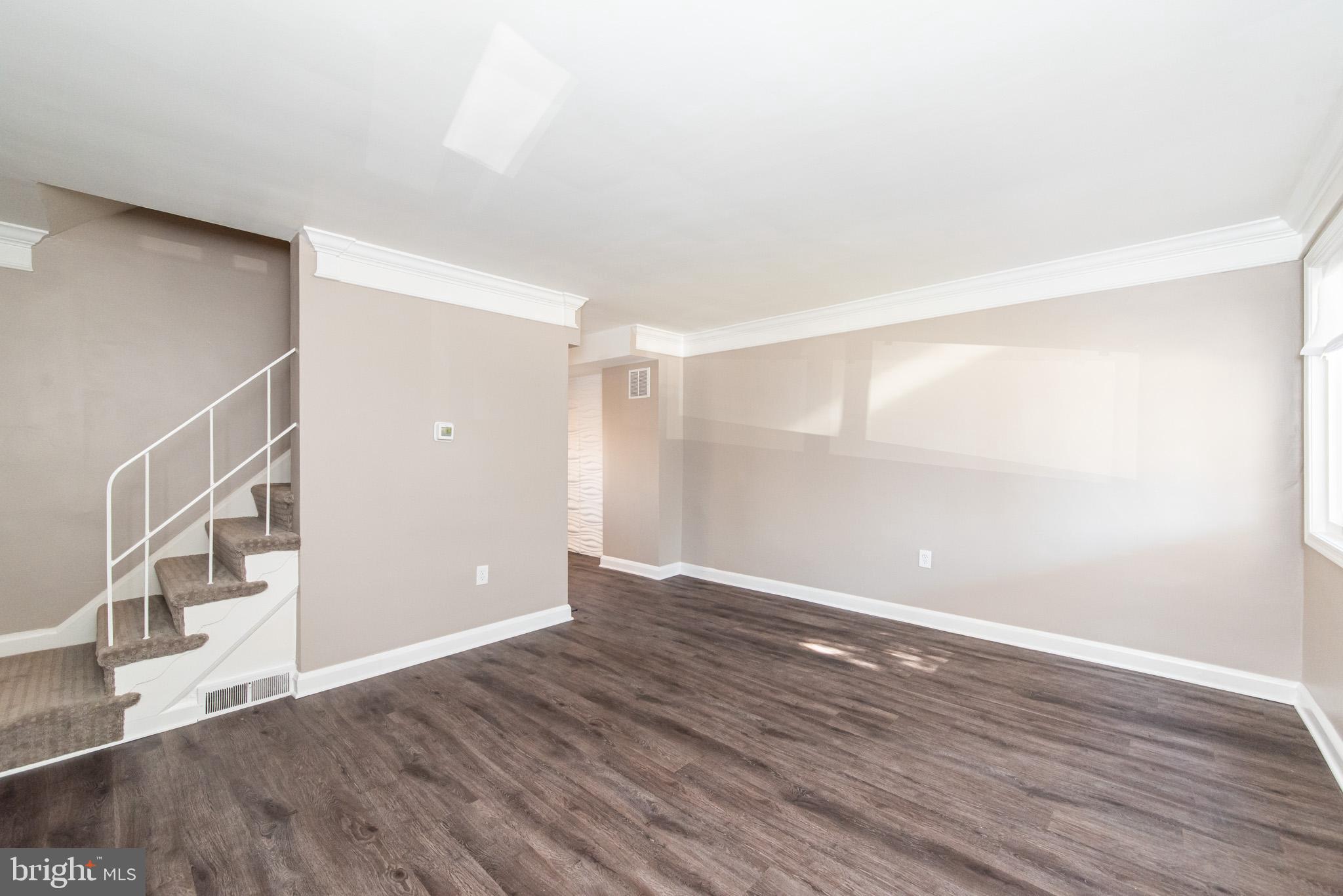 1812 Swansea Road Baltimore, MD 21239 - Photo 5 of 37 Brand new laminate flooring