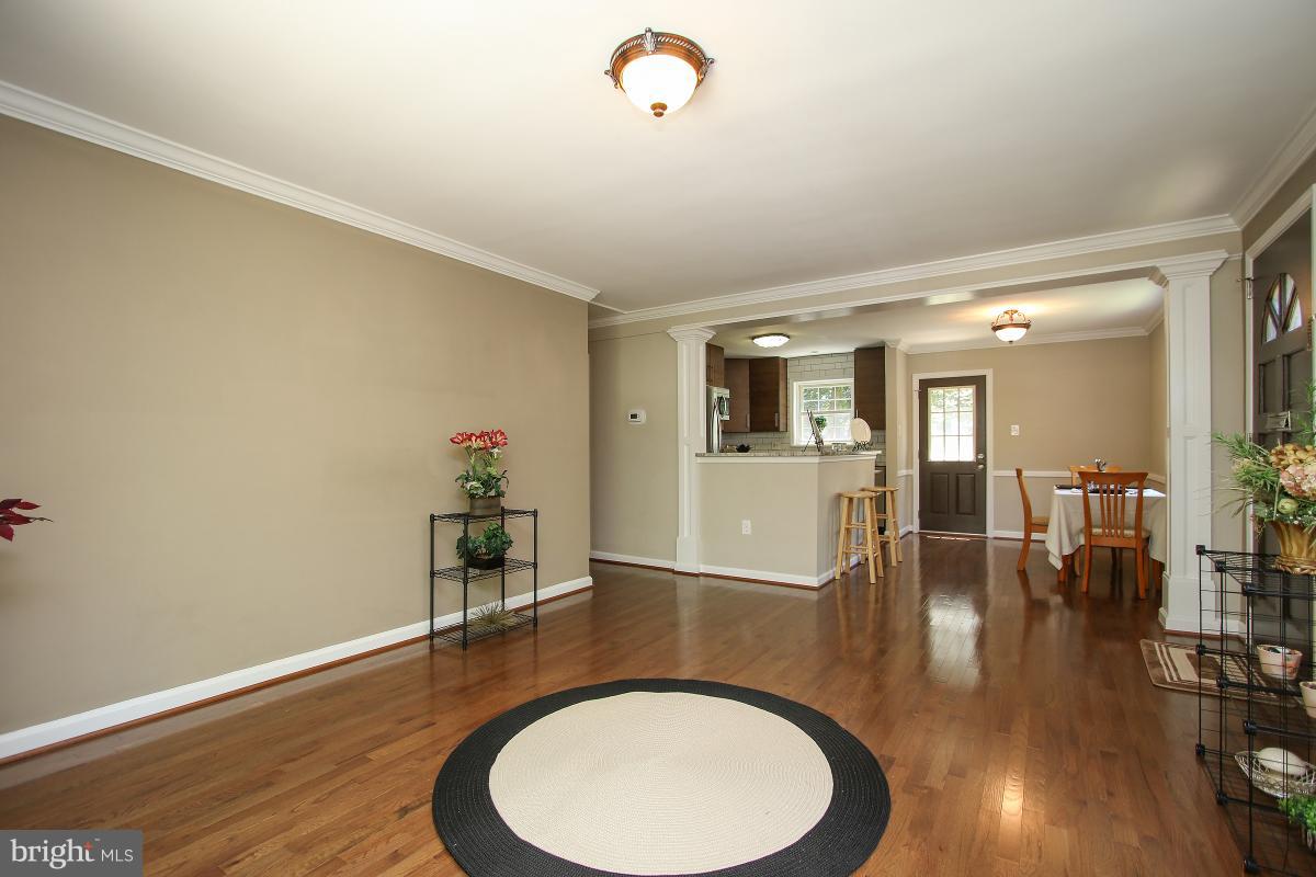 4043 Adams Drive Silver Spring, MD 20902 - Photo 6 of 30 Elegant columns leading to dining room and kitchen