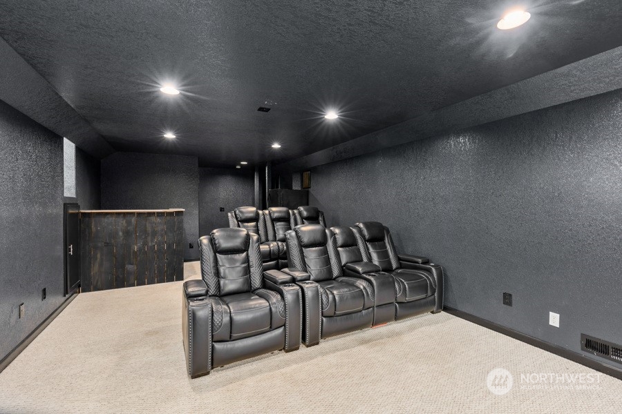 9600 Gastaeson Lane Southwest Rochester, WA 98579 - Photo 29 of 39 a projector room with furniture