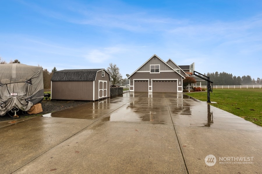 9600 Gastaeson Lane Southwest Rochester, WA 98579 - Photo 4 of 39 a front view of a house with a yard