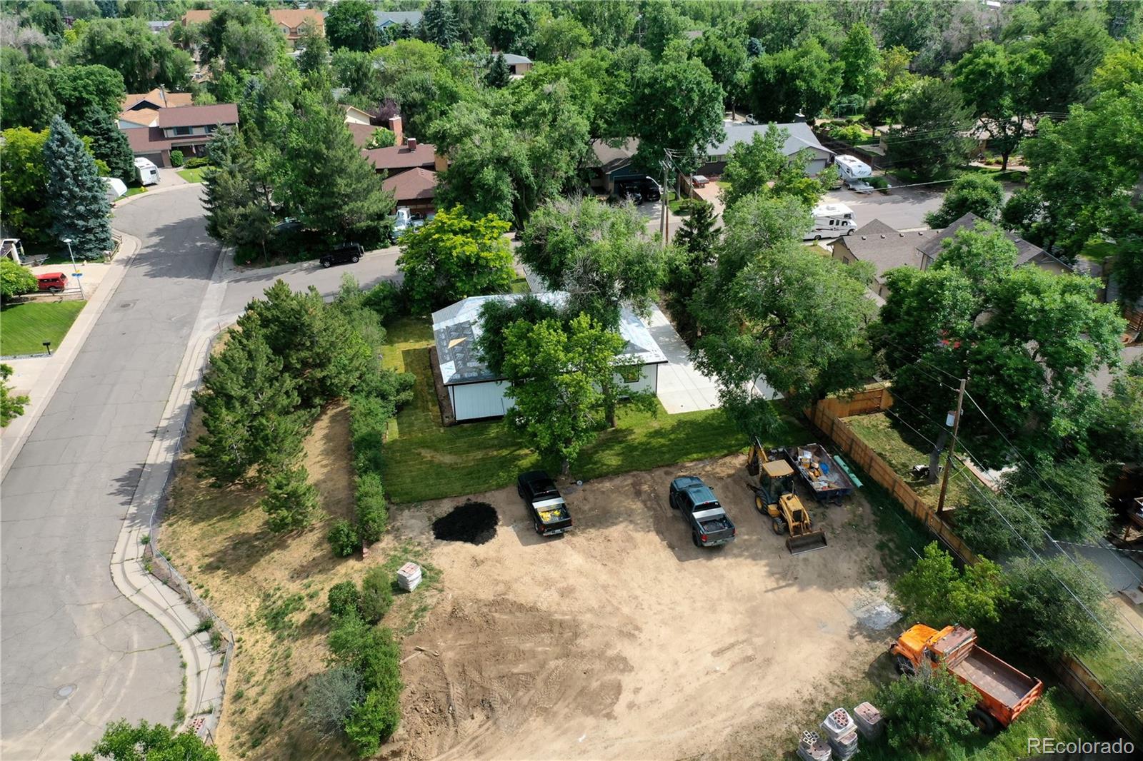 6493 Everett Street Arvada, CO 80004 - Photo 2 of 3 an aerial view of a house with a yard