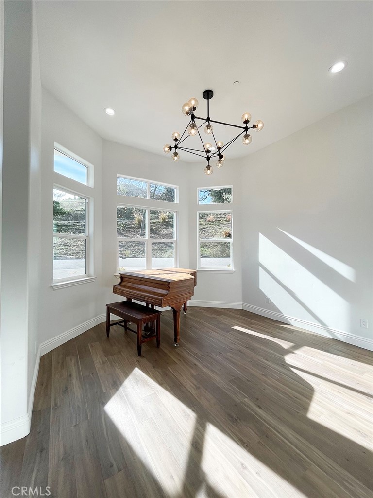8560 Corriente Road Atascadero, CA 93422 - Photo 17 of 53 a living room with furniture and a window