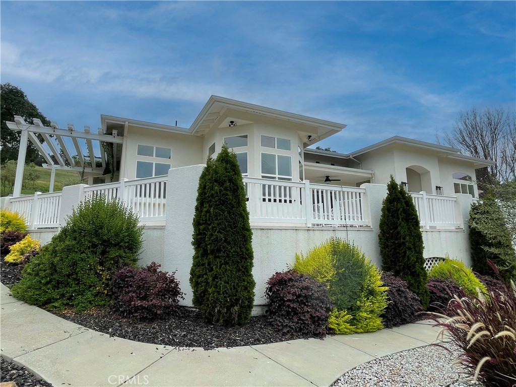 8560 Corriente Road Atascadero, CA 93422 - Photo 2 of 53 a front view of a house with garden