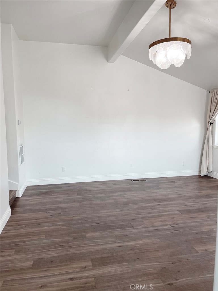 8560 Corriente Road Atascadero, CA 93422 - Photo 23 of 53 a view of an empty room and wooden floor