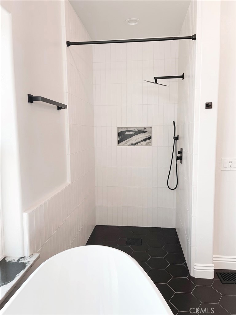 8560 Corriente Road Atascadero, CA 93422 - Photo 26 of 53 a bathroom with a shower and a sink