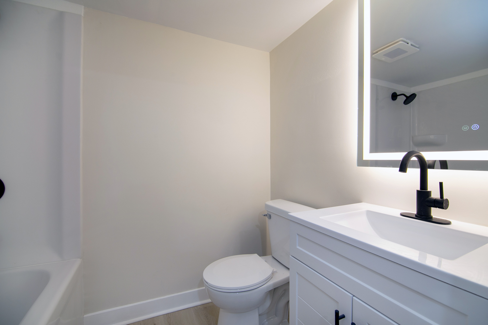 2773 North 900 East Road Ashkum, IL 60911 - Photo 21 of 30 a bathroom with a sink a toilet and mirror