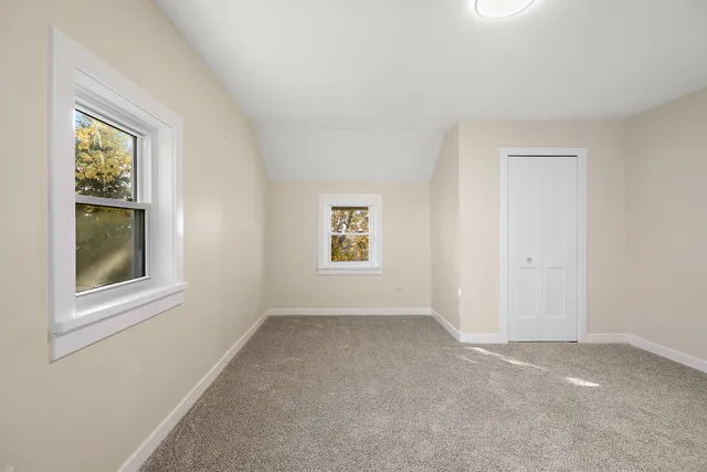 a view of an empty room and window