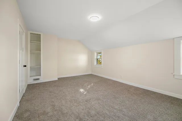 a view of a yard with an ocean view