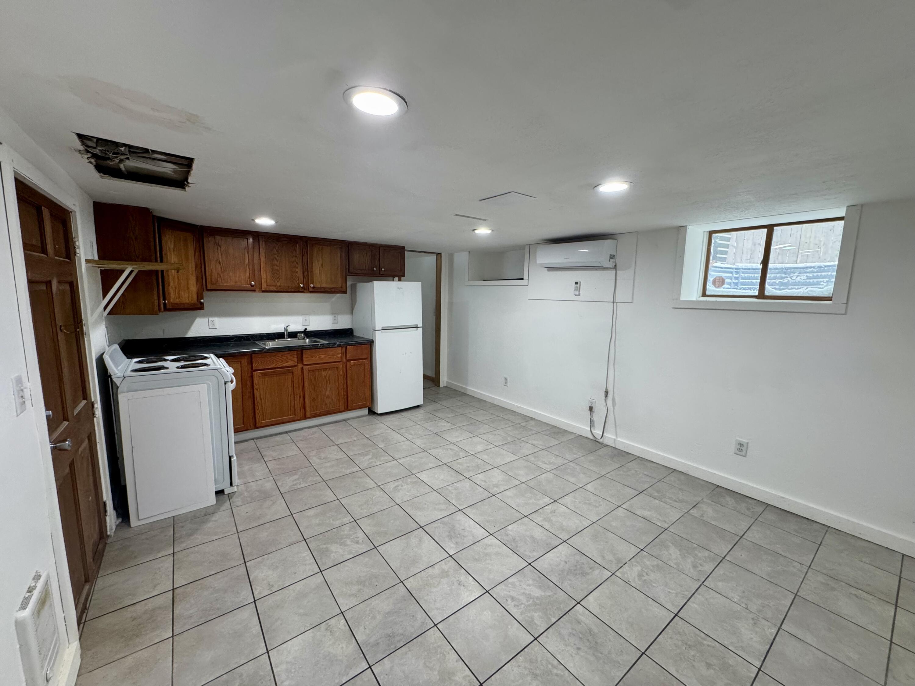 5601 37th Avenue Kenosha, WI 53144 - Photo 24 of 31 Basement Kitchen/Living Room