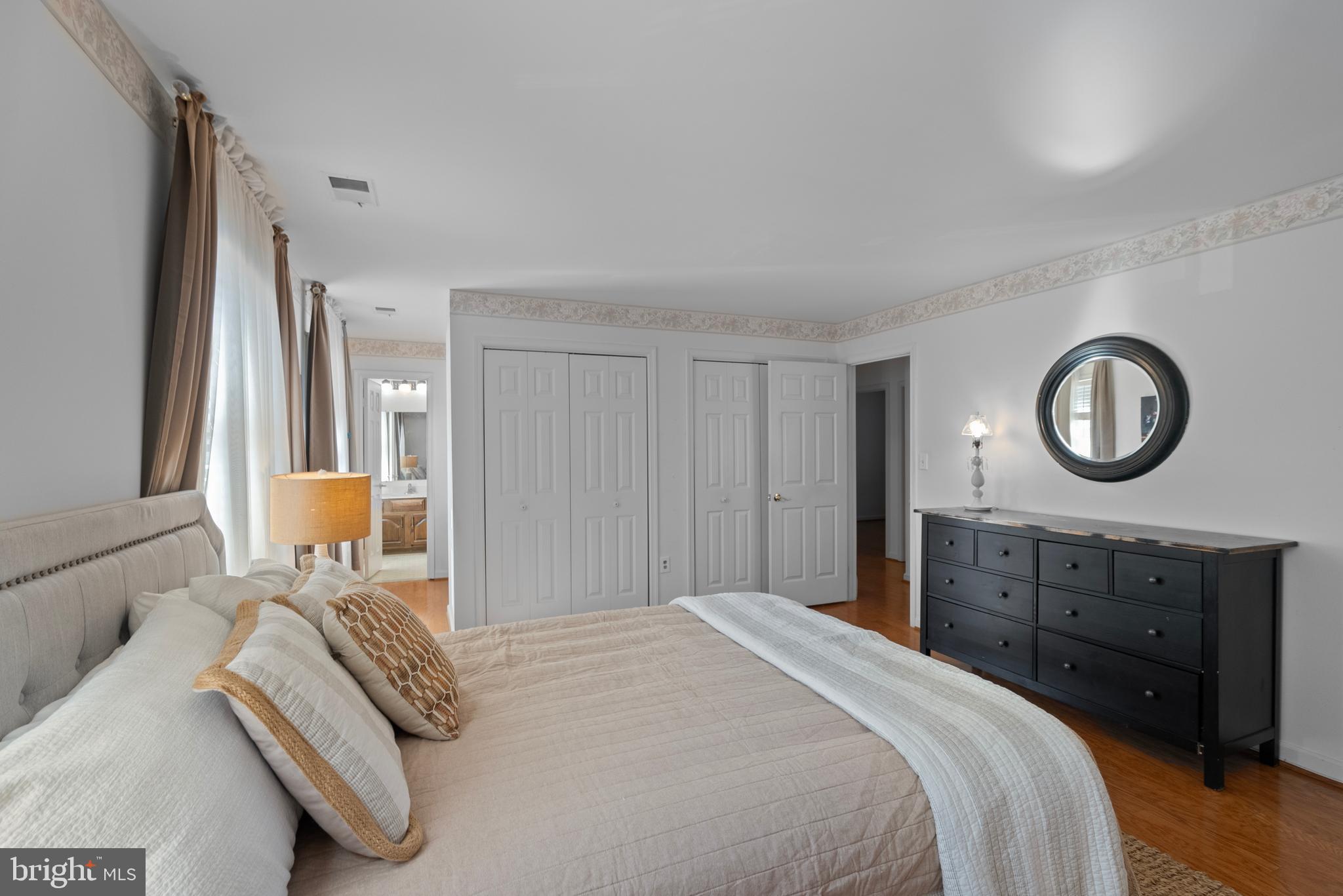 6726 Blanche Drive Lorton, VA 22079 - Photo 36 of 66 a bedroom with a bed and dresser