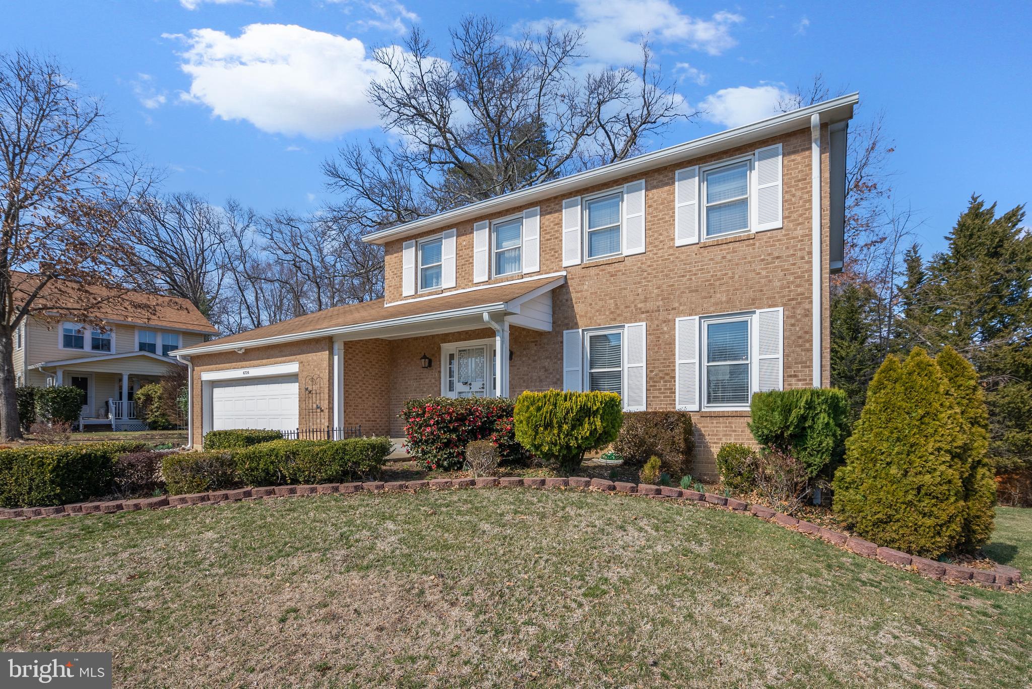 6726 Blanche Drive Lorton, VA 22079 - Photo 4 of 66 a front view of house with yard and green space