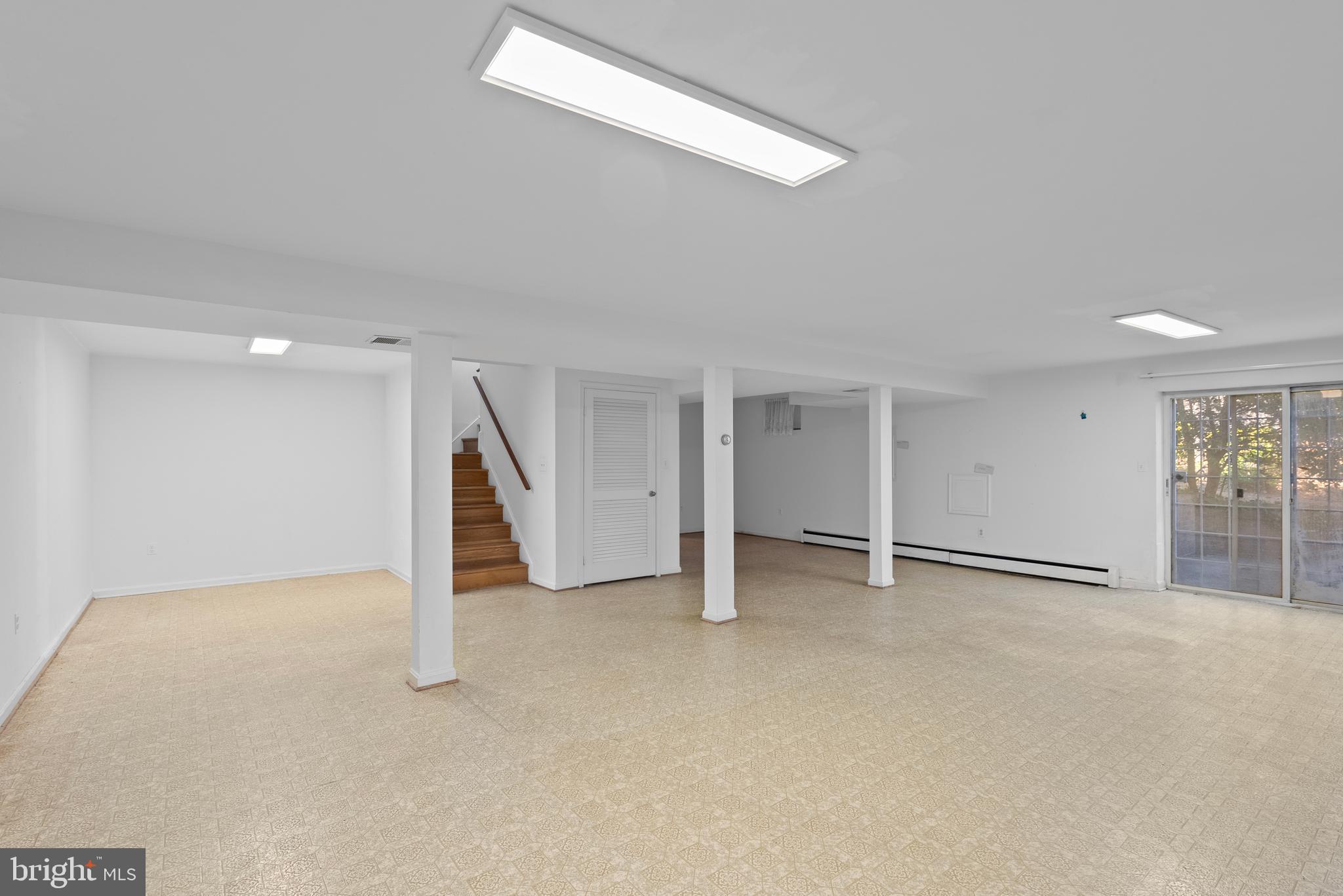 6726 Blanche Drive Lorton, VA 22079 - Photo 49 of 66 an empty room with a ceiling fan and window