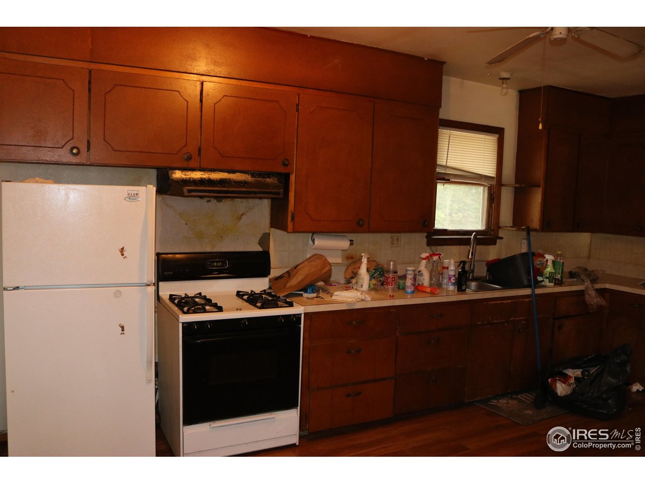 2235 5th Street Greeley, CO 80631 - Photo 6 of 21 a kitchen with cabinets and appliances