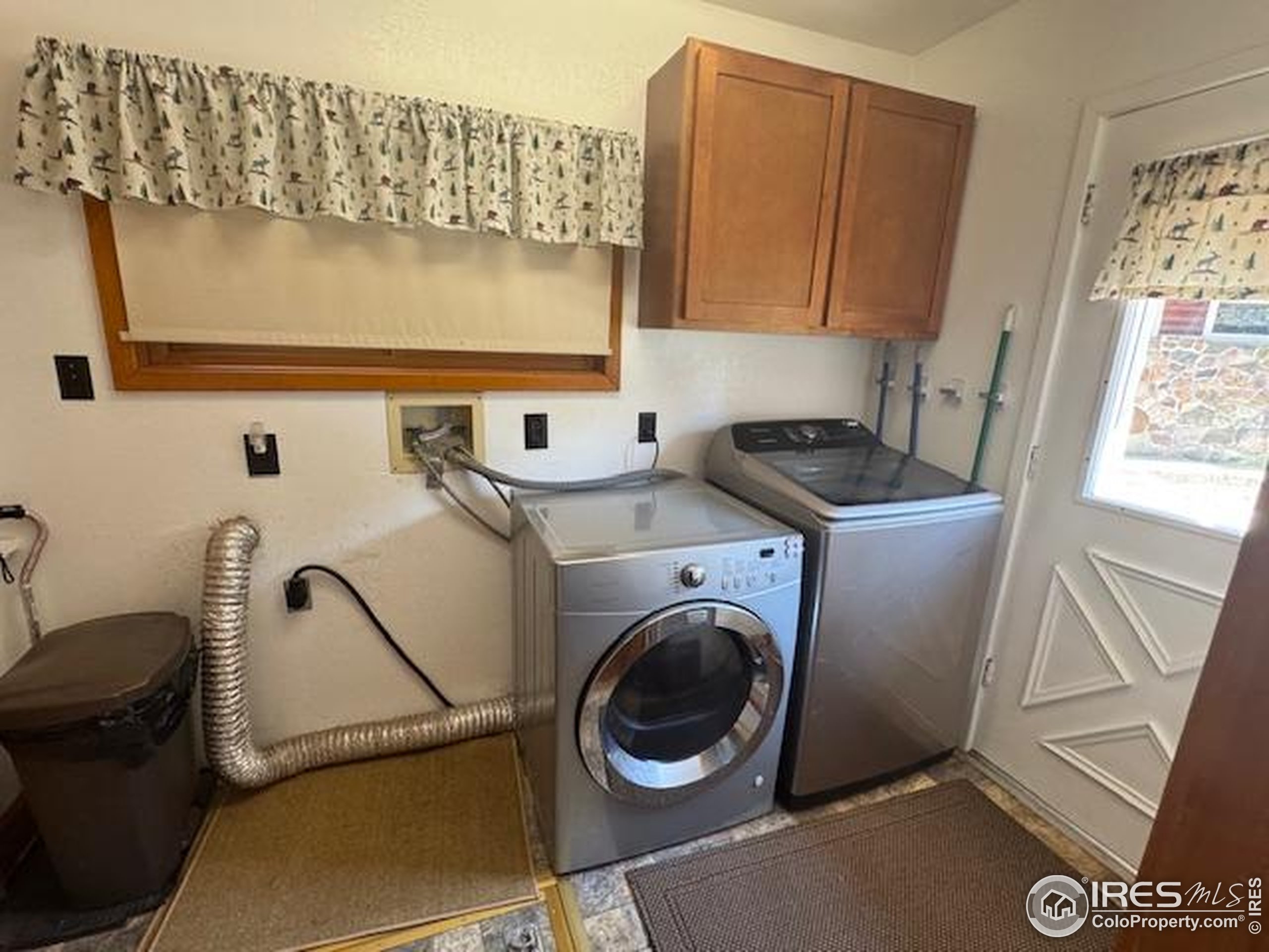 110 Meadow Lane Bellvue, CO 80512 - Photo 15 of 28 a utility room with dryer and washer