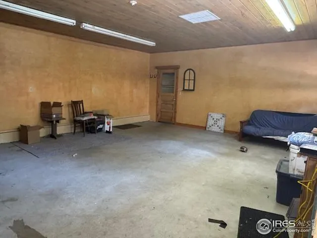 a view of a livingroom with furniture and windows