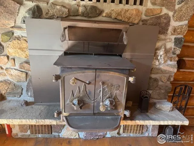 a view of fireplace and living room