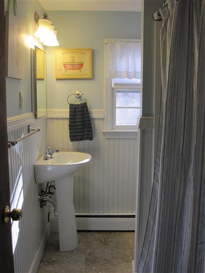 10 Crowell Road Sandwich, MA 02563 - Photo 6 of 13 a bathroom with a sink a toilet and mirror