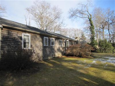 10 Crowell Road Sandwich, MA 02563 - Photo 7 of 13 a view of a house with a yard