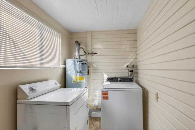 a utility room with dryer and washer