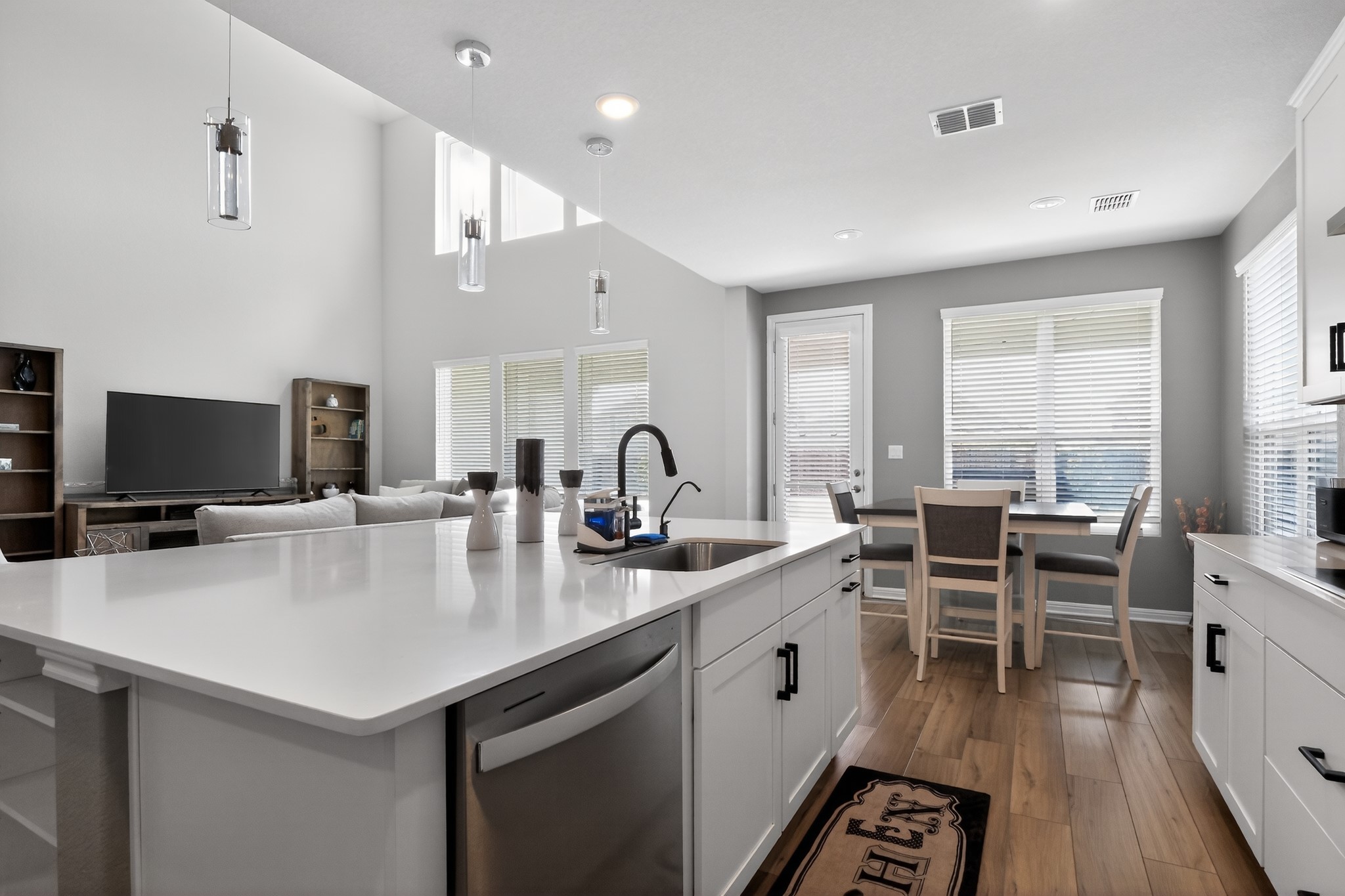 114 Bosco Road Hutto, TX 78634 - Photo 13 of 39 A spacious, airy kitchen features a large island and ample light.