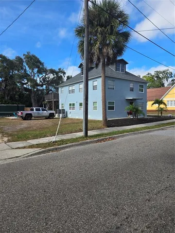 a view of a street with houses