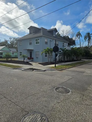a view of a street with houses