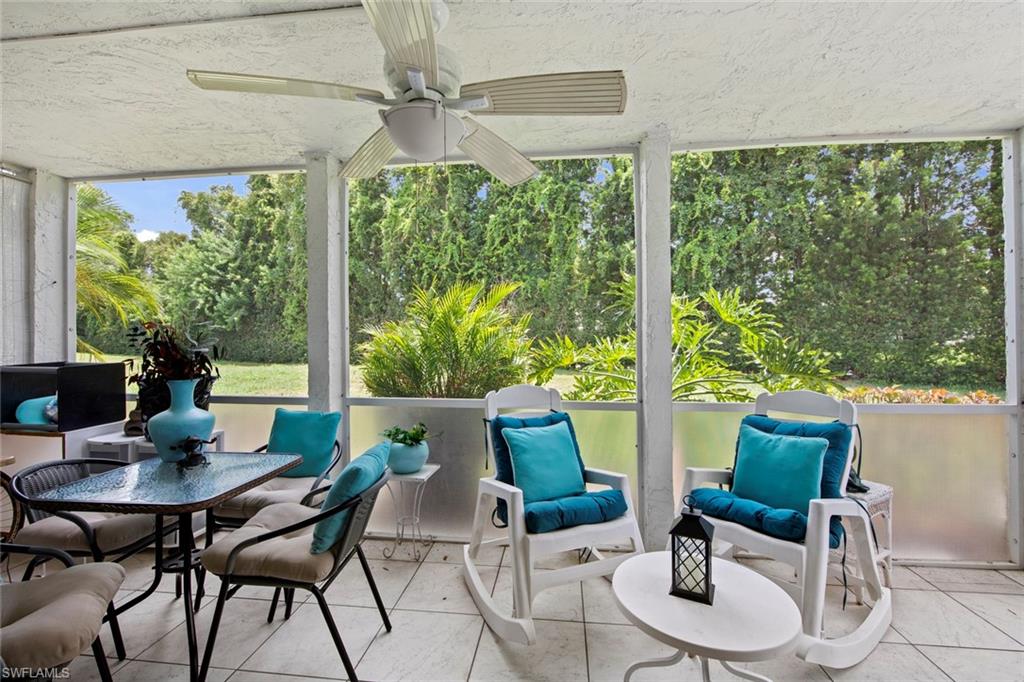 740 Teryl Road, Unit 1 Naples, FL 34112 - Photo 11 of 21 a view of a dining room with furniture window and outside view