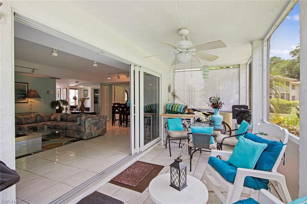 740 Teryl Road, Unit 1 Naples, FL 34112 - Photo 12 of 21 a view of a dining room with furniture window and outside view