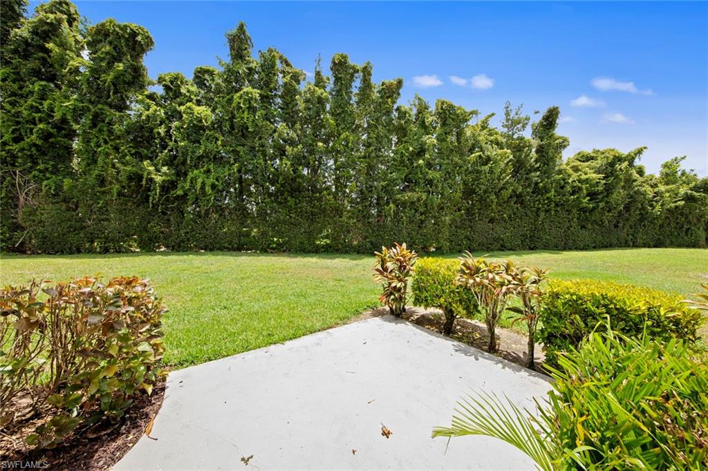 740 Teryl Road, Unit 1 Naples, FL 34112 - Photo 14 of 21 a view of a garden with an outdoor space