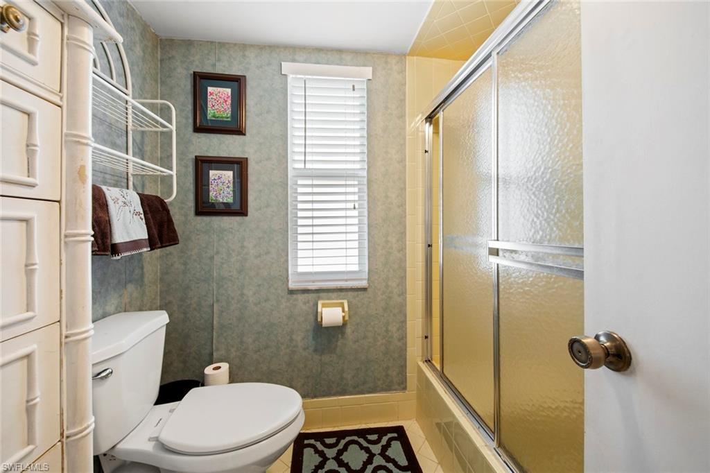 740 Teryl Road, Unit 1 Naples, FL 34112 - Photo 21 of 21 a bathroom with a toilet and a shower