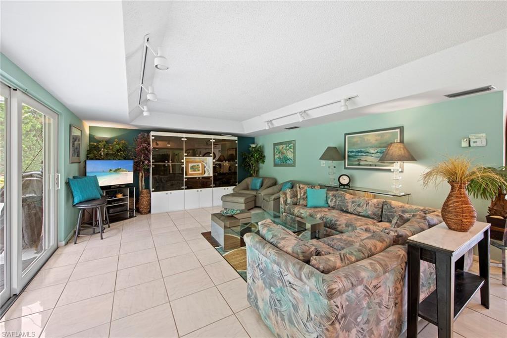 740 Teryl Road, Unit 1 Naples, FL 34112 - Photo 8 of 21 a living room with furniture