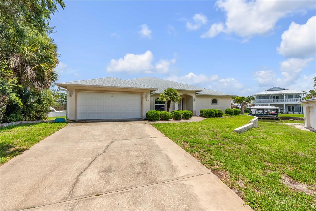 192 Azalea Road Edgewater, FL 32141 - Photo 55 of 94 a front view of house with yard