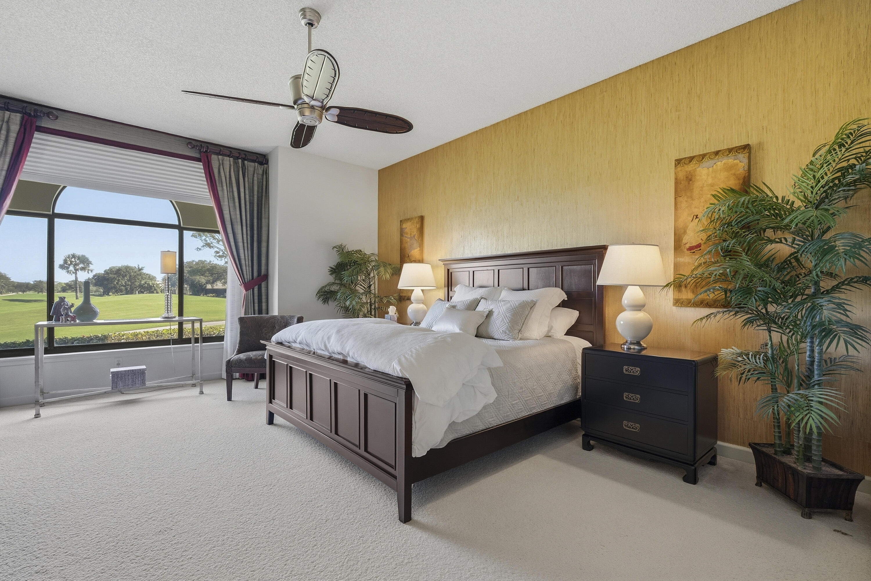 6997 Southeast Pacific Drive Stuart, FL 34997 - Photo 19 of 57 a bed room with a bed and a large window