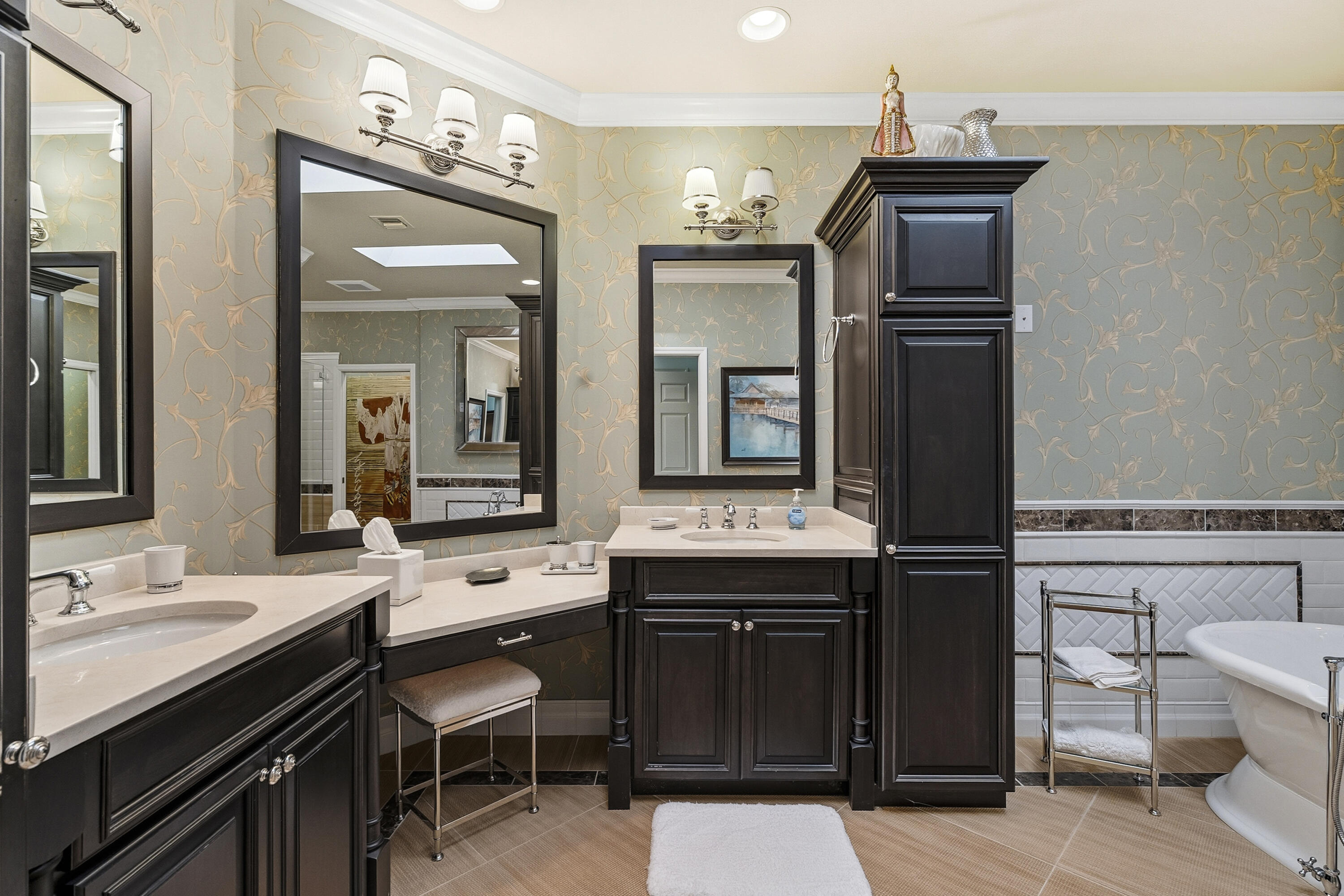 6997 Southeast Pacific Drive Stuart, FL 34997 - Photo 23 of 57 a bathroom with a sink a toilet and mirror