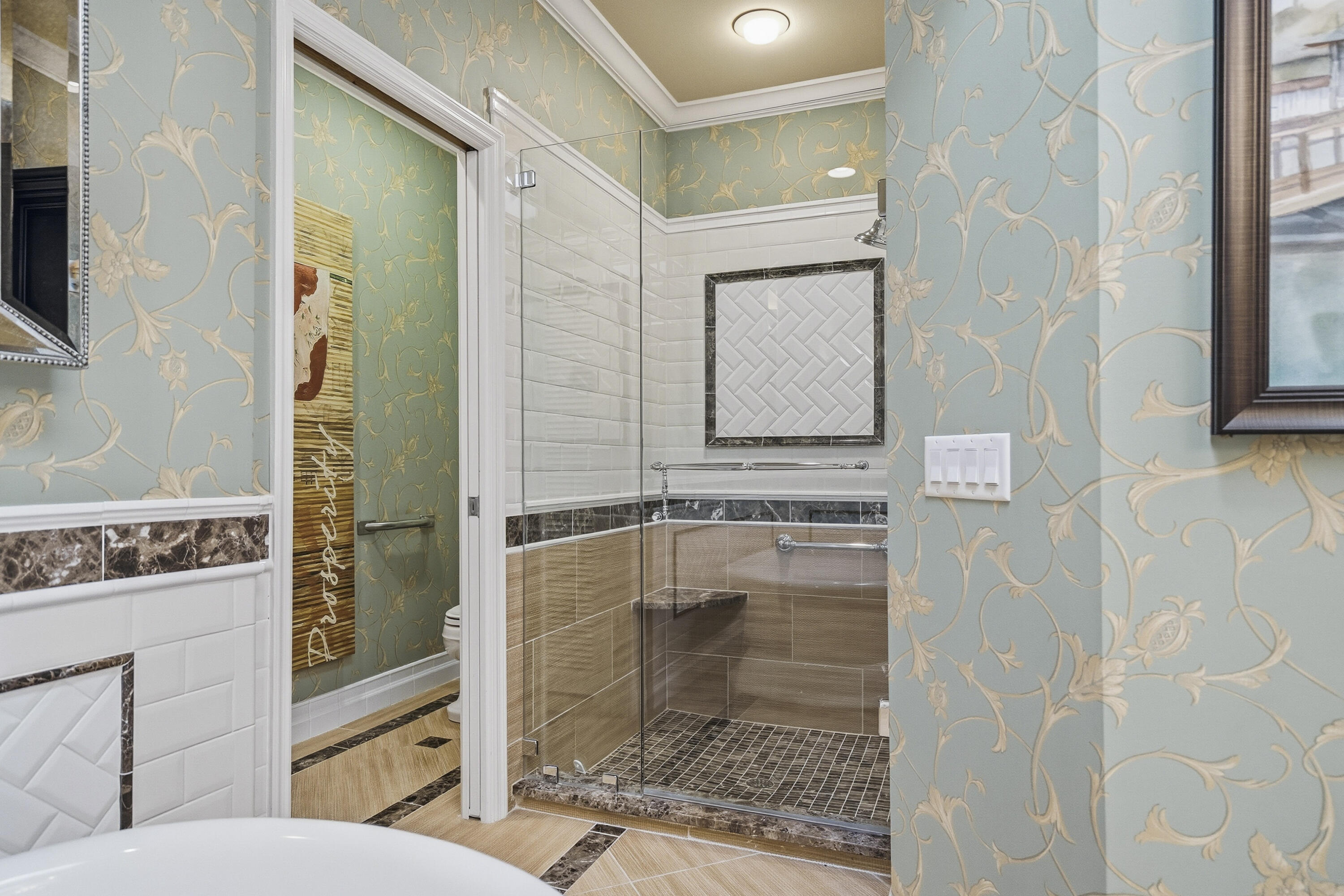 6997 Southeast Pacific Drive Stuart, FL 34997 - Photo 25 of 57 a bathroom with a granite countertop shower a mirror and a sink