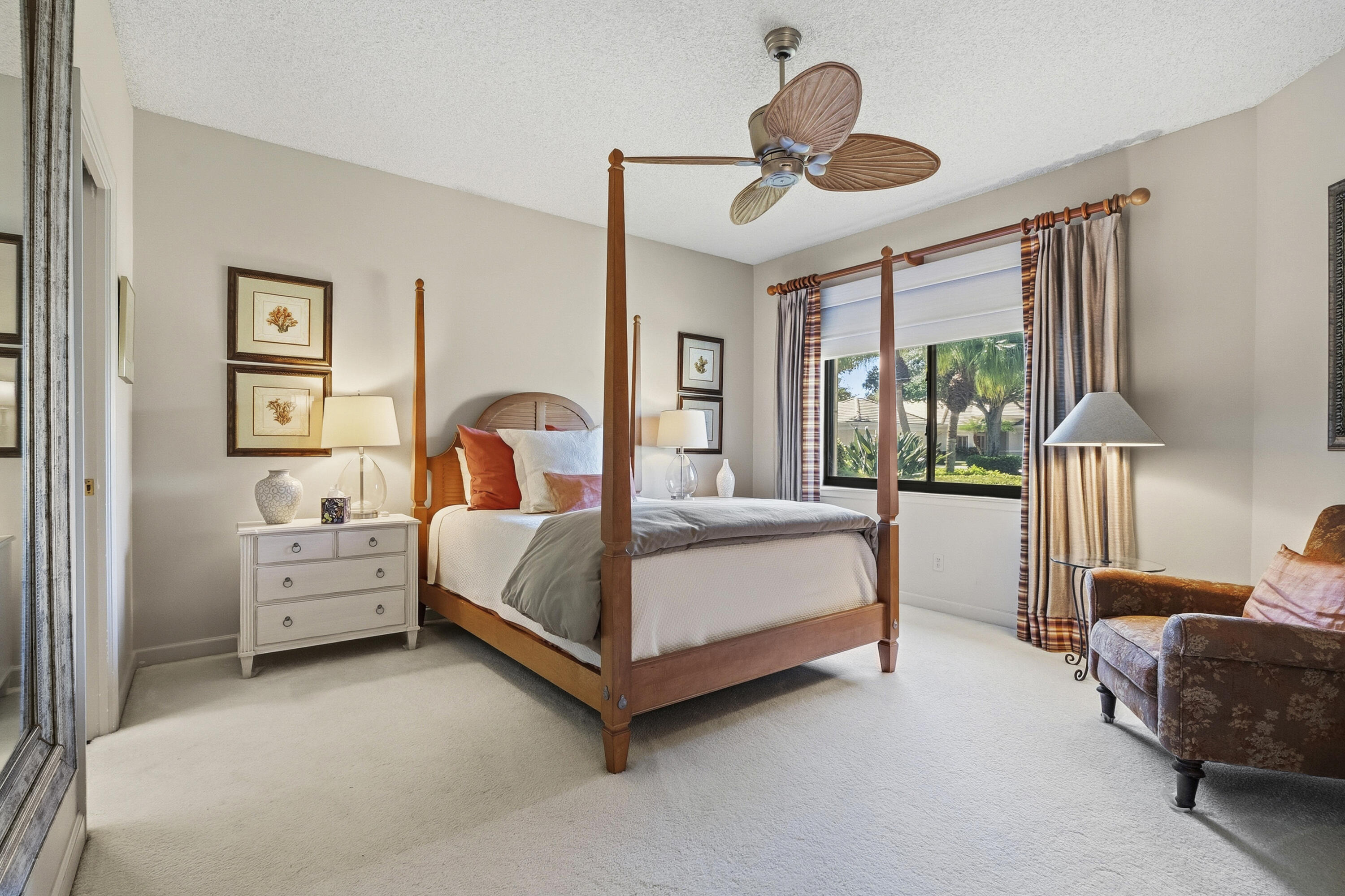 6997 Southeast Pacific Drive Stuart, FL 34997 - Photo 26 of 57 a bed room with a bed and a large window