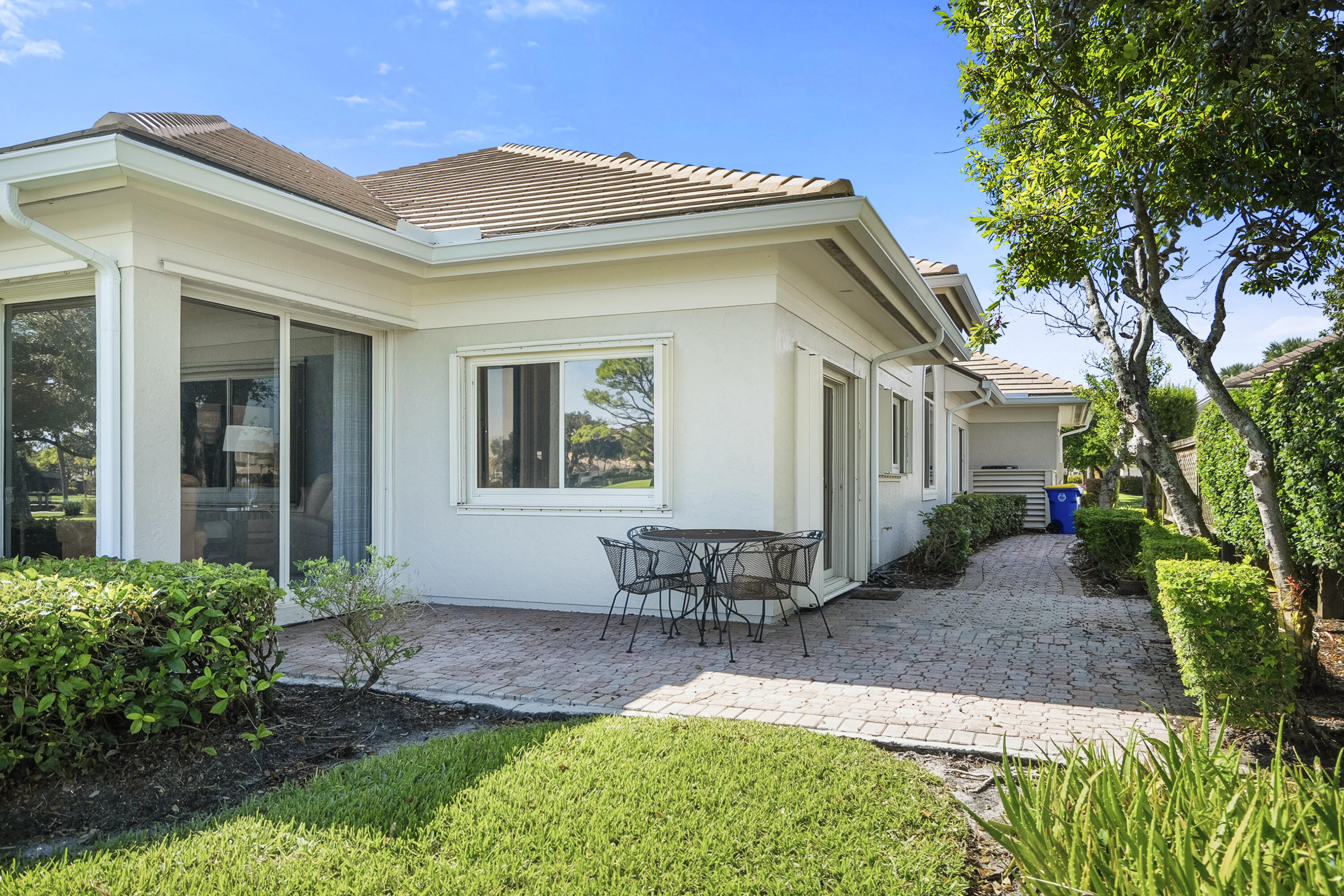 6997 Southeast Pacific Drive Stuart, FL 34997 - Photo 33 of 57 a view of a house with backyard and sitting area