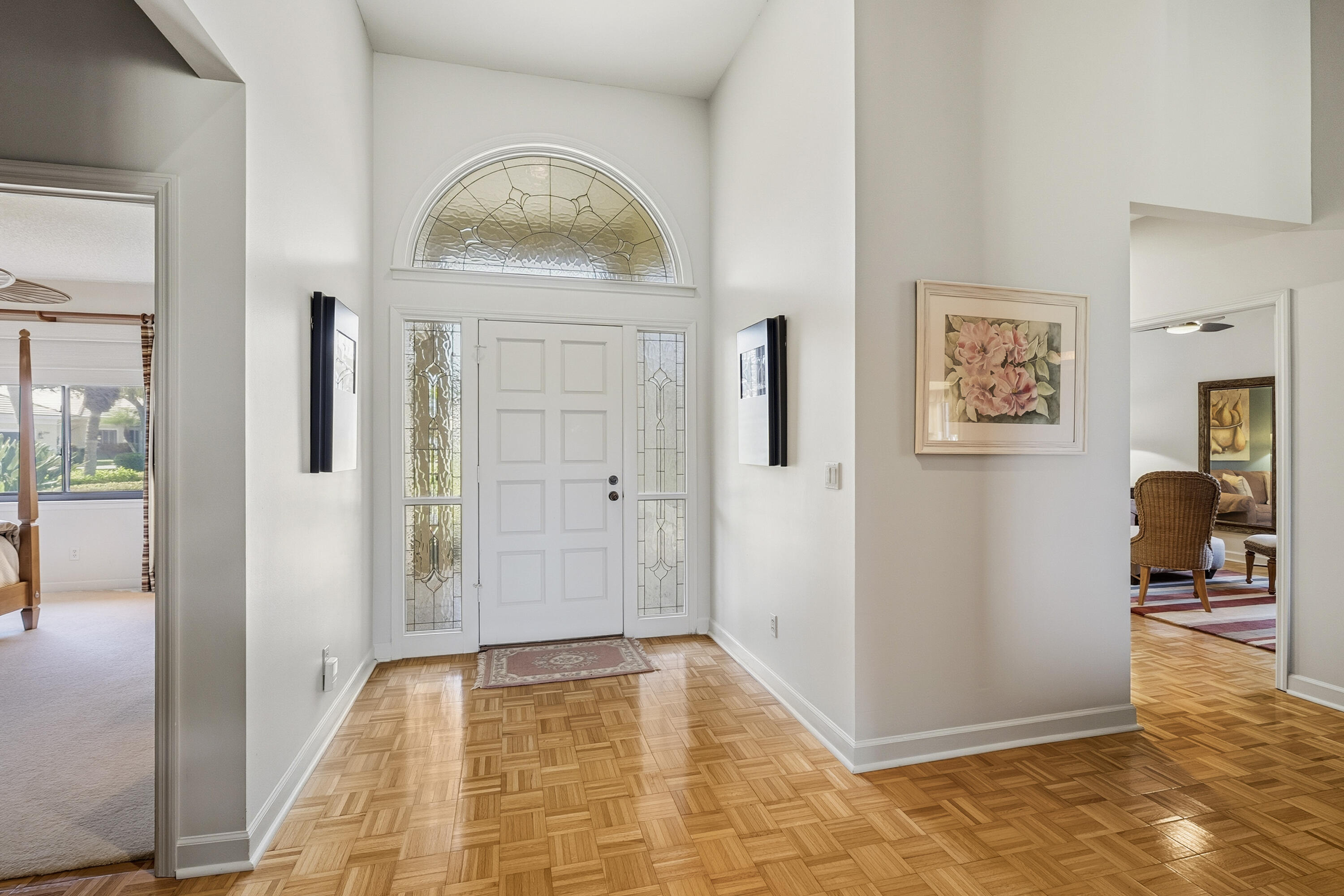 6997 Southeast Pacific Drive Stuart, FL 34997 - Photo 5 of 57 a view of a hallway with front door
