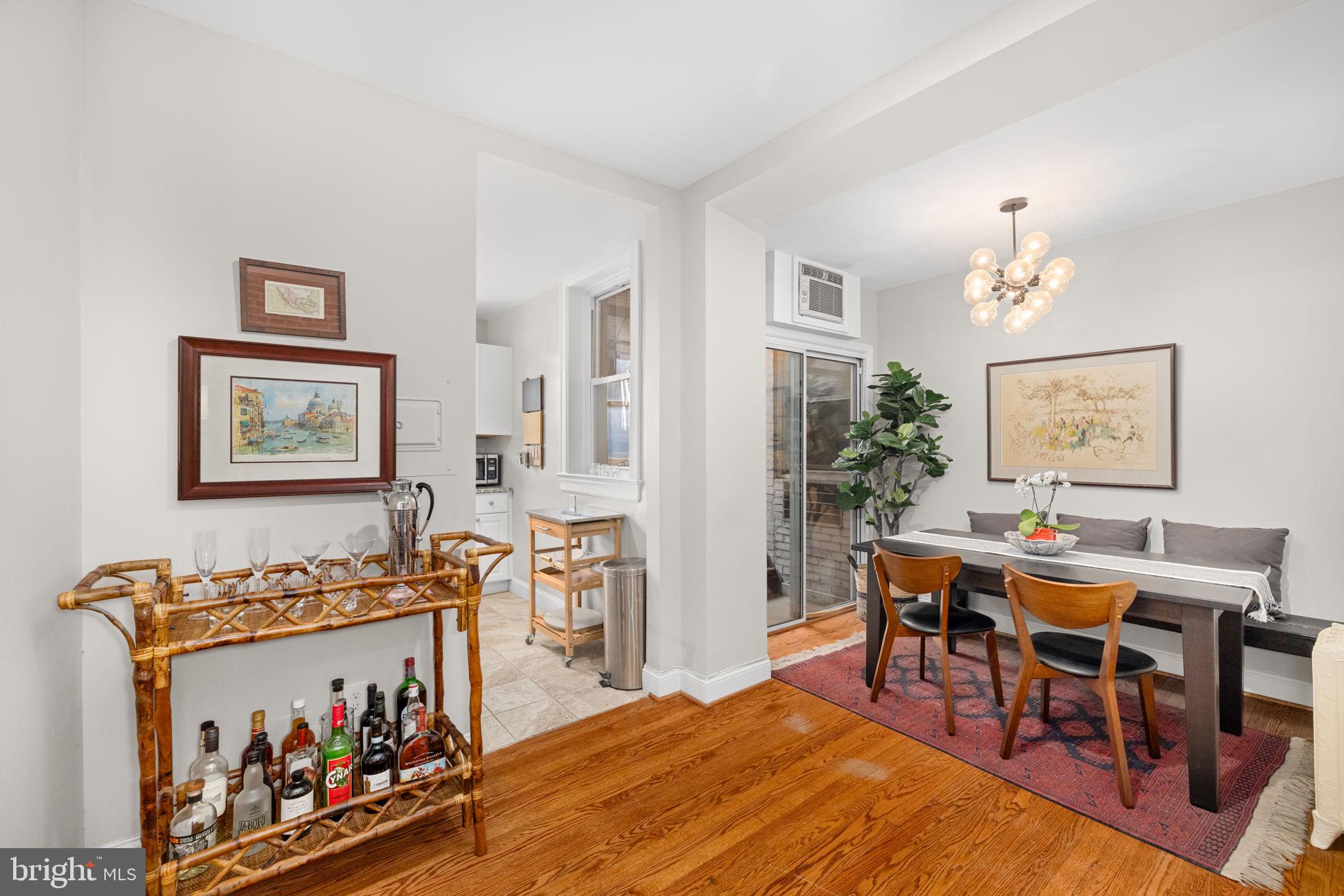 1855 Calvert Street Northwest, Unit 203 Washington, DC 20009 - Photo 4 of 9 a view of a workspace with furniture