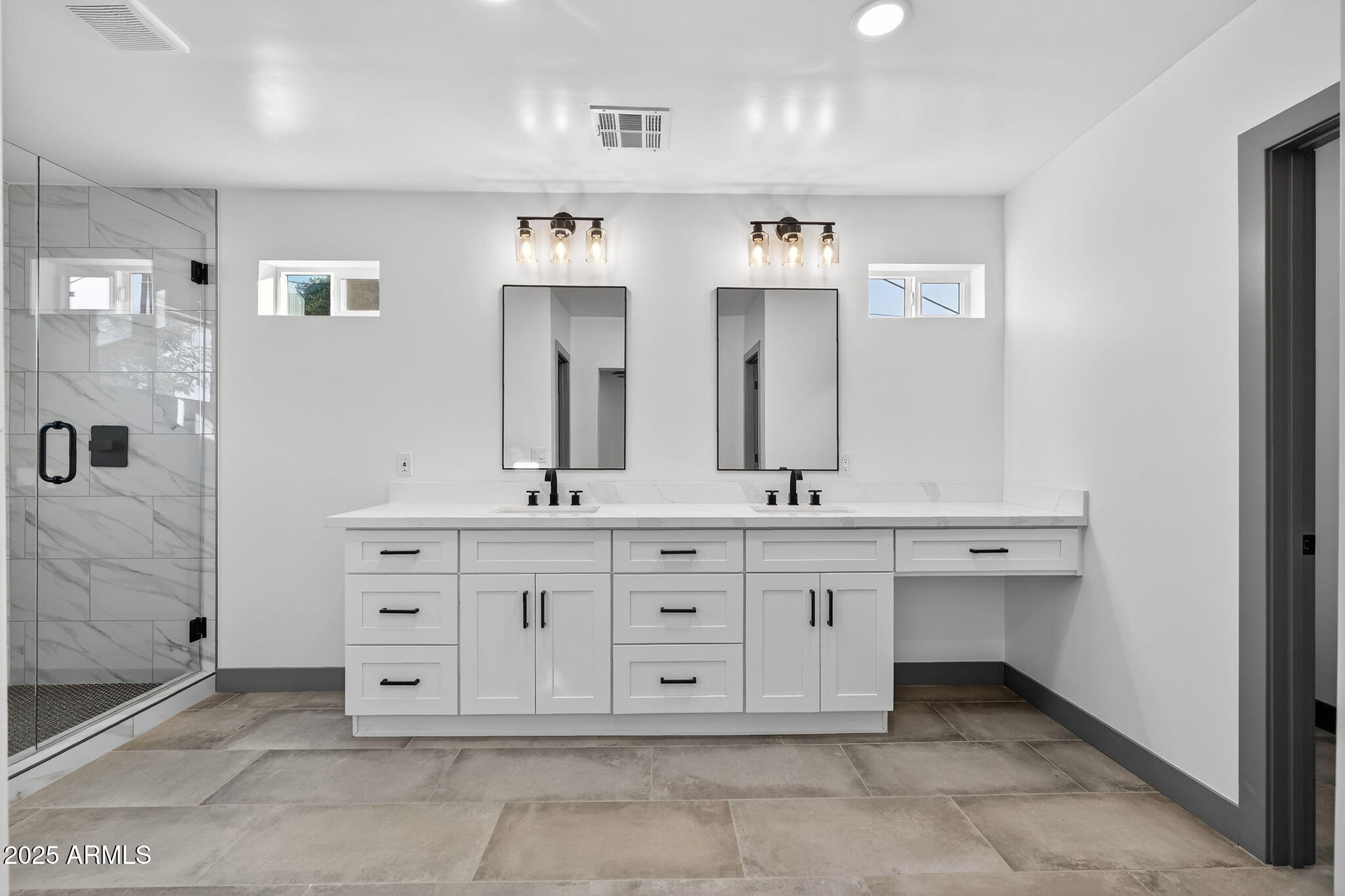 3241 North 27th Place Phoenix, AZ 85016 - Photo 11 of 25 a spacious bathroom with a granite countertop double vanity sink mirror and bathtub