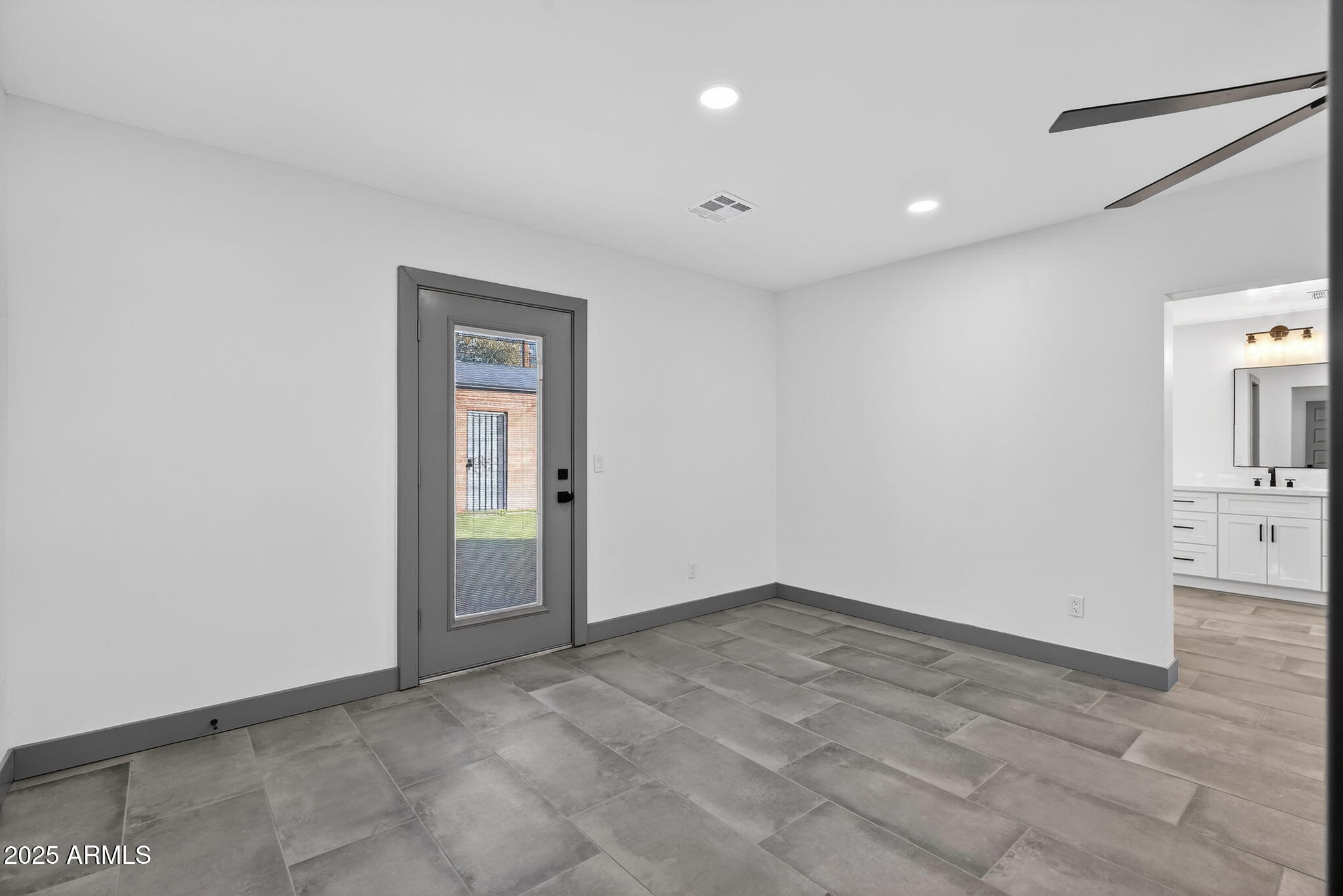 3241 North 27th Place Phoenix, AZ 85016 - Photo 13 of 25 a view of an empty room